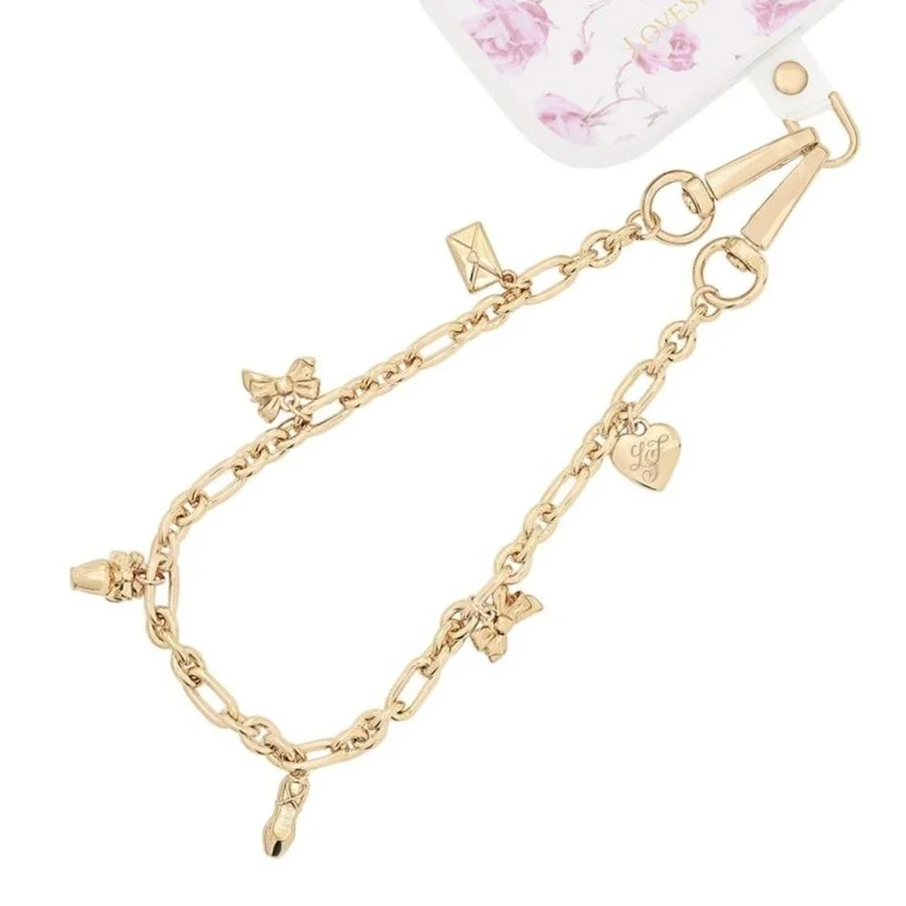 Loveshackfancy x case mate gold phone charm with heart and bow charms